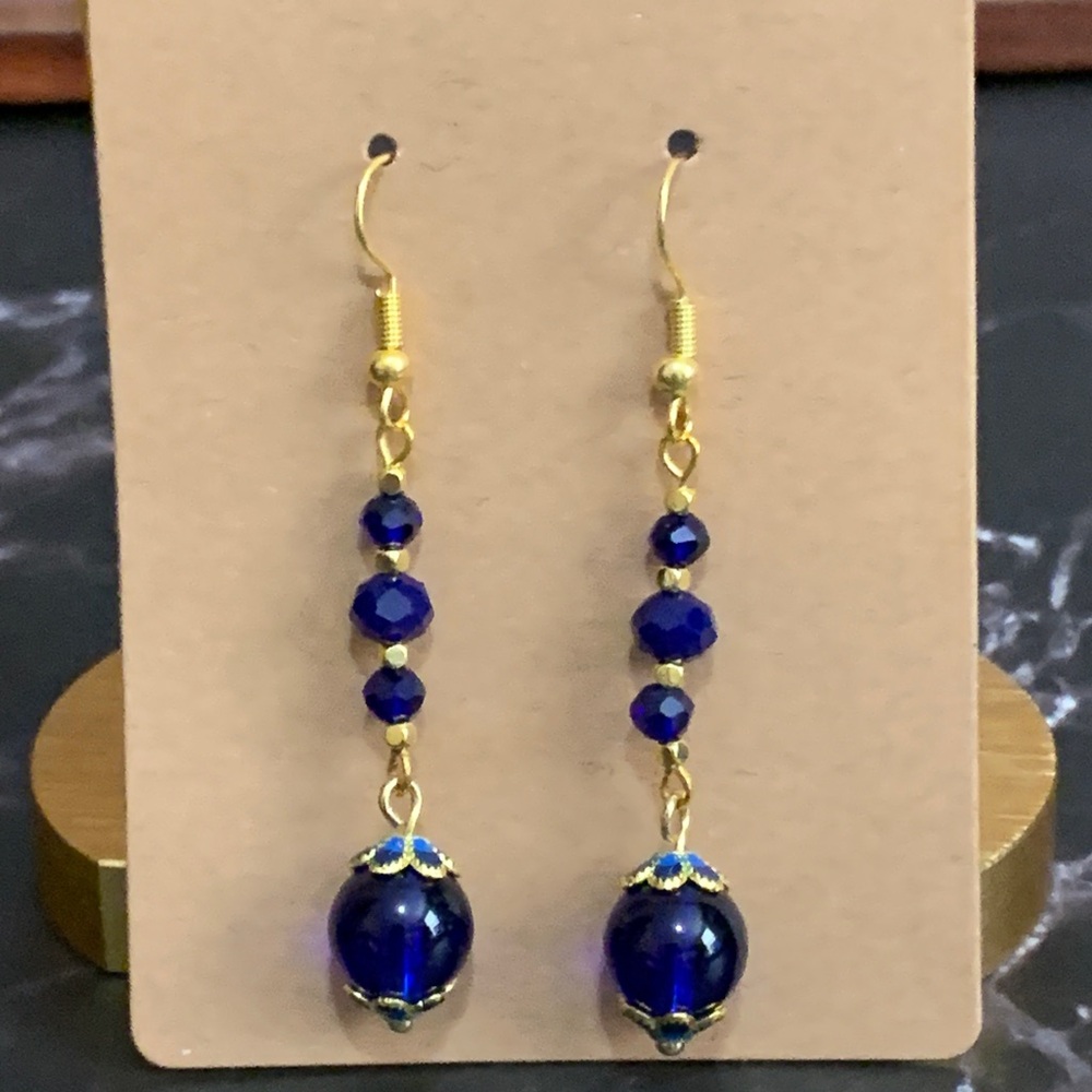 Handmade gold tone blue glass bead earrings